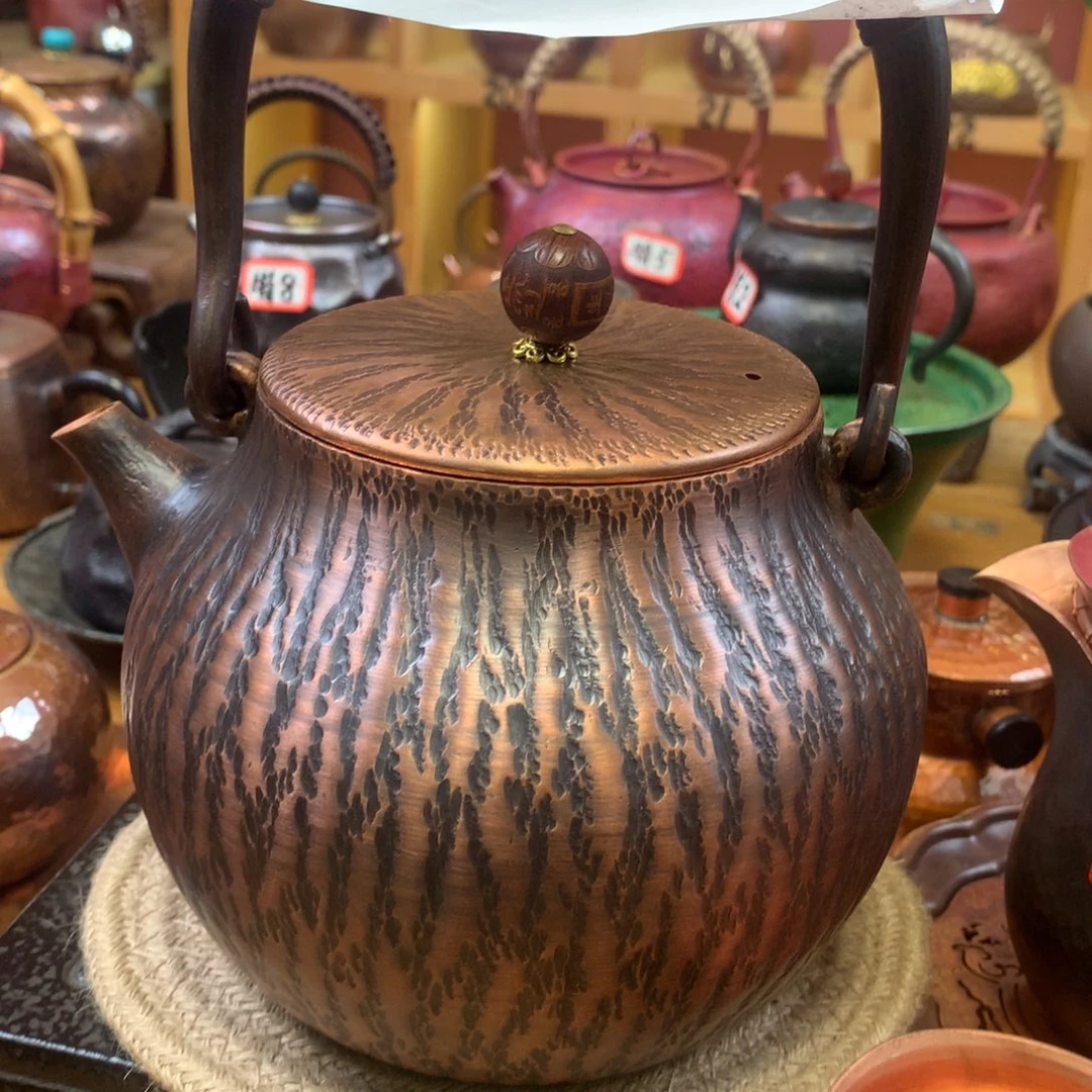 张***琳加厚树皮纹老铜壶