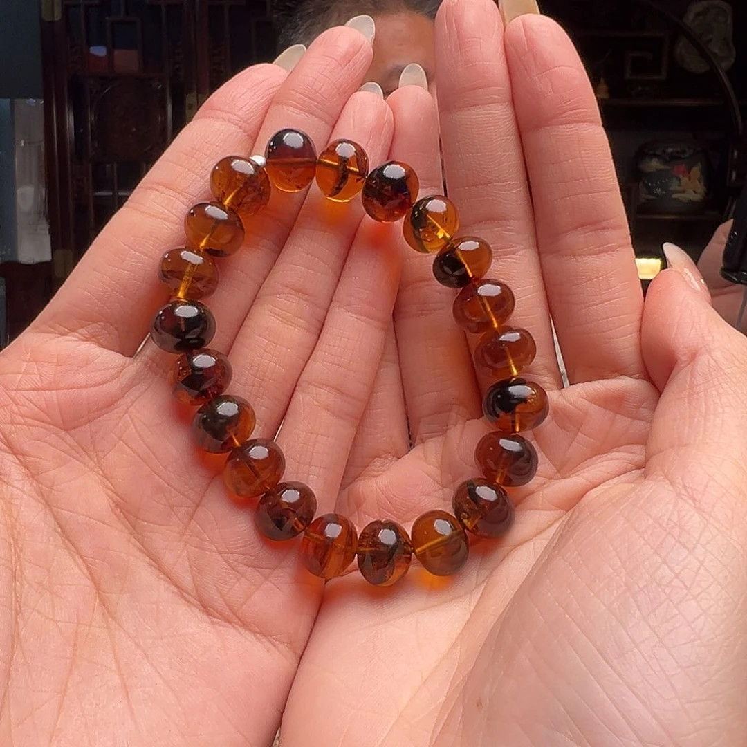 琥珀裸石未镶嵌?**朵抚顺琥珀20247-1。11mm