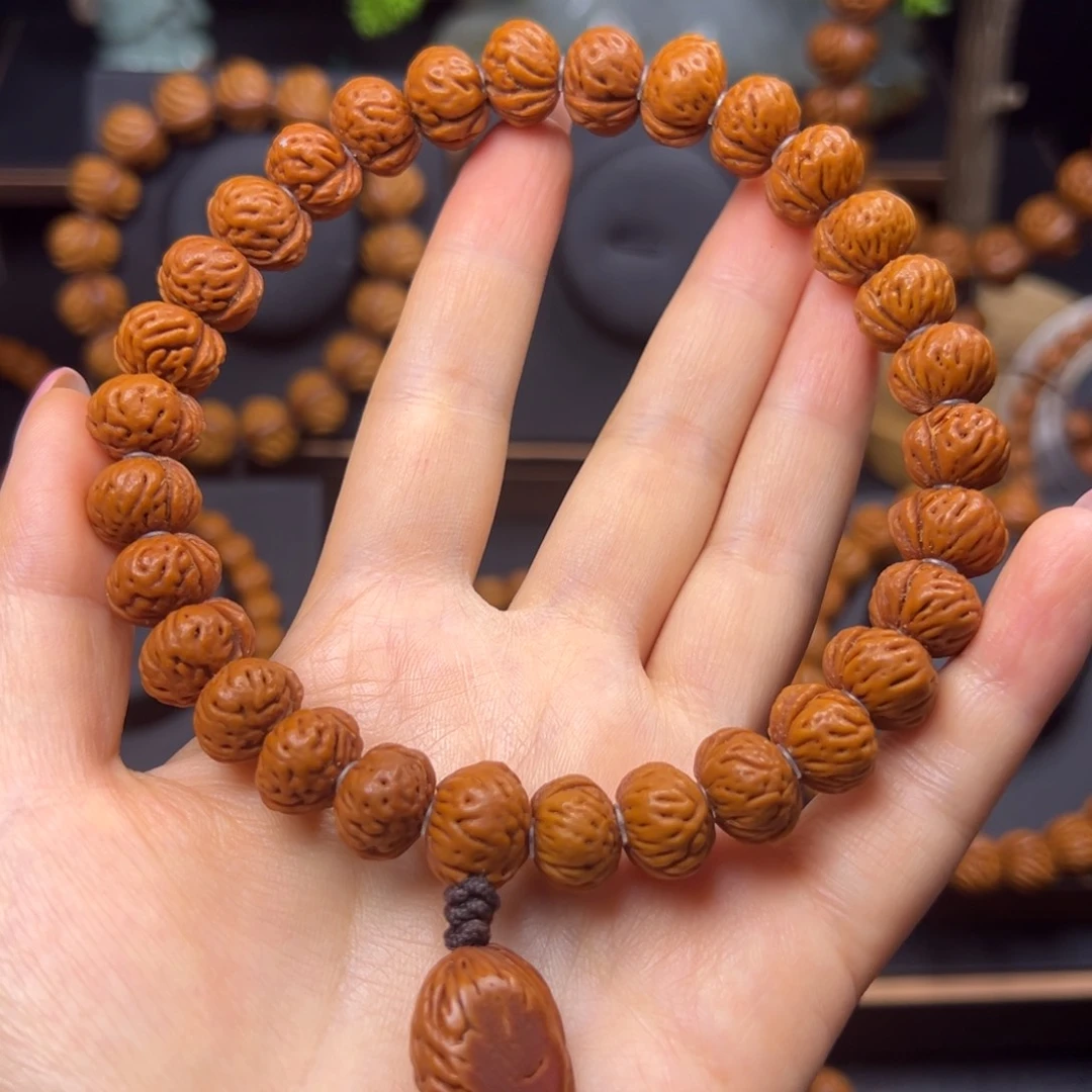 雪***，手串桃核野生蟠桃13