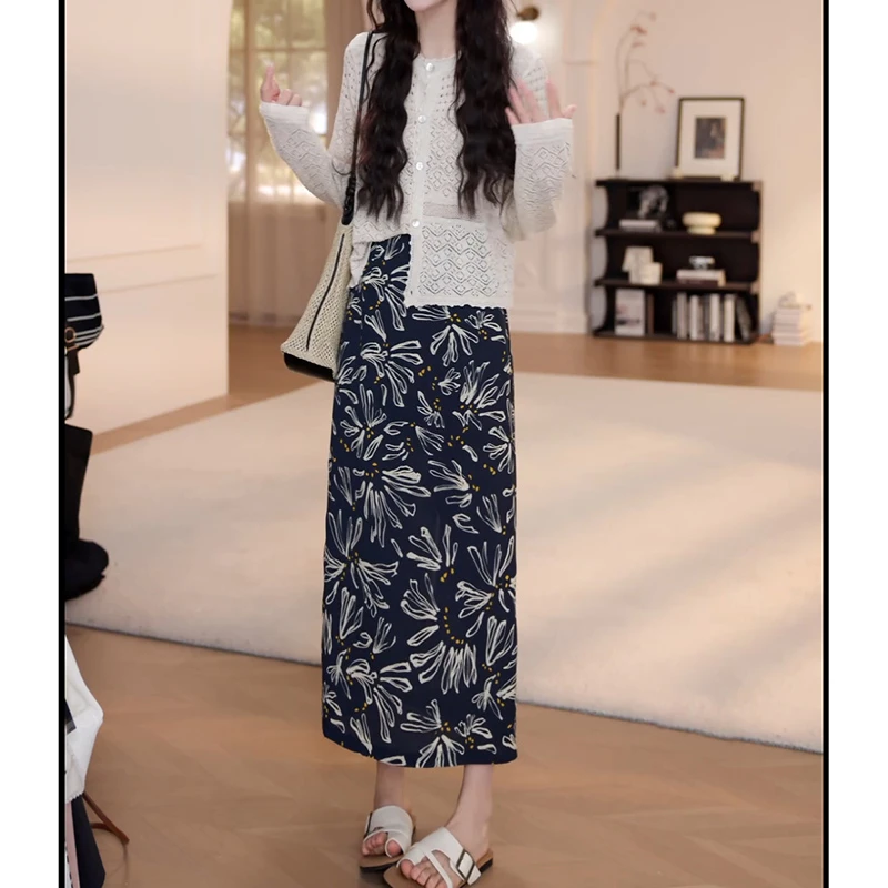 2025春夏新款镂空针织衫上衣+花色半身裙两件套套装LK2502950