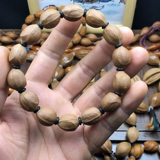 吊坠橄榄核福利蜜桃臀
