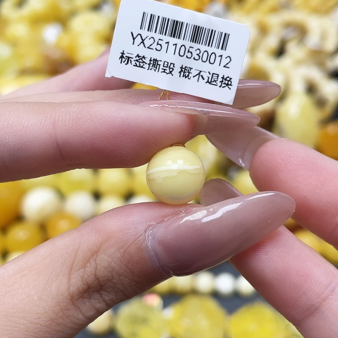 琥珀未镶嵌裸石10.8瓷白一线天圆珠 瑕