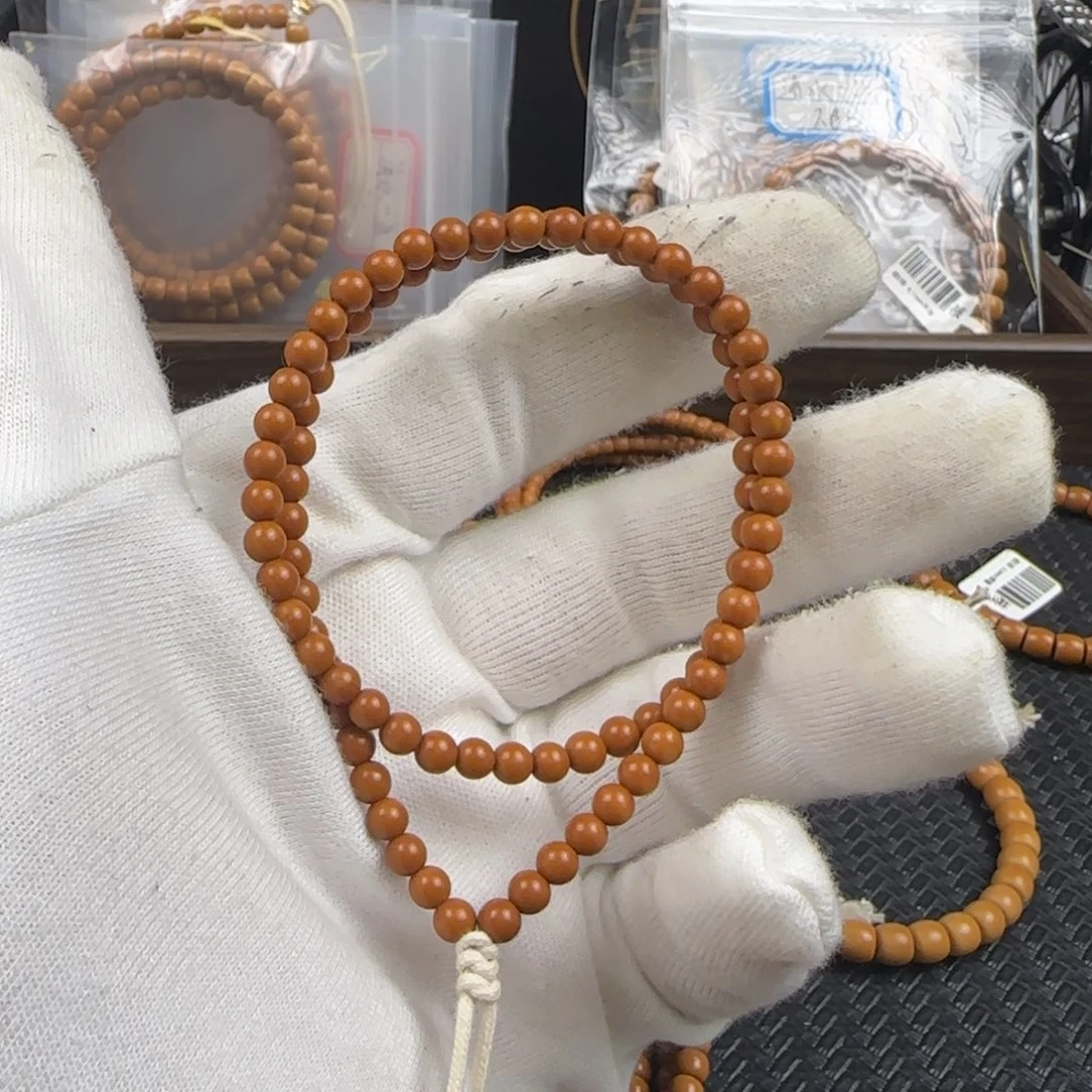 橄榄核吊坠5.0mm老挝核尖圆珠90颗手持