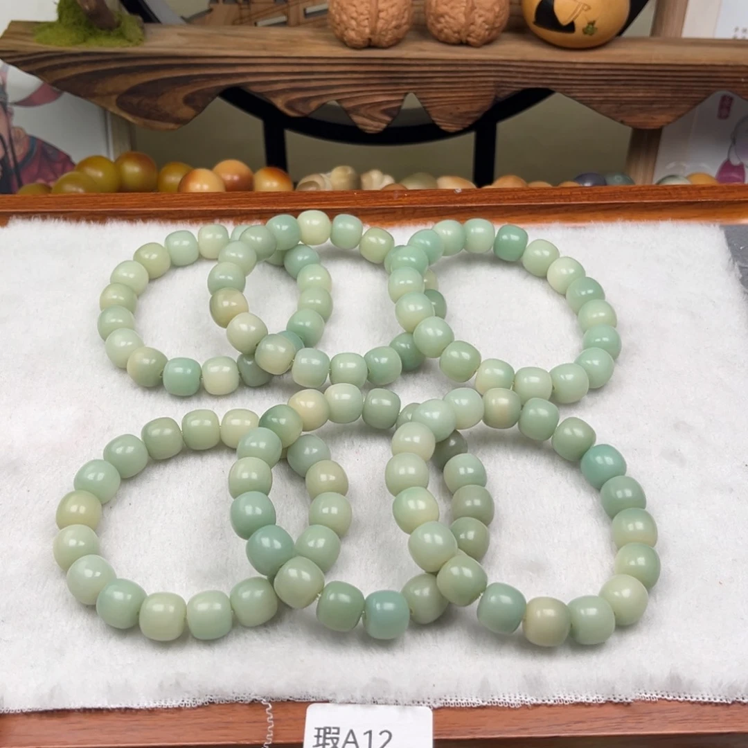 菩提根/象牙果吊坠瑕A12桶珠11mm一串随机