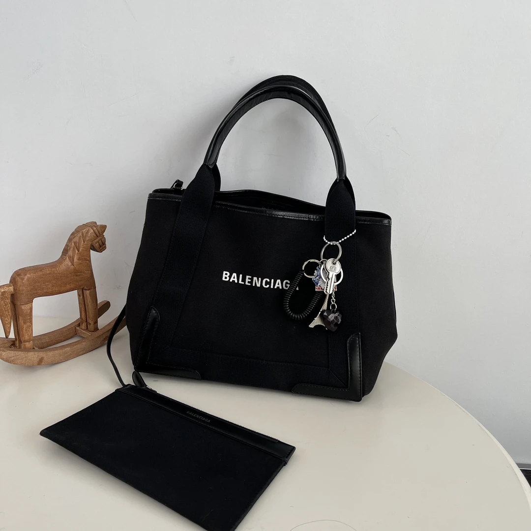 95新 Balenciaga/巴黎世家 黑色帆布沙滩手提斜挎包