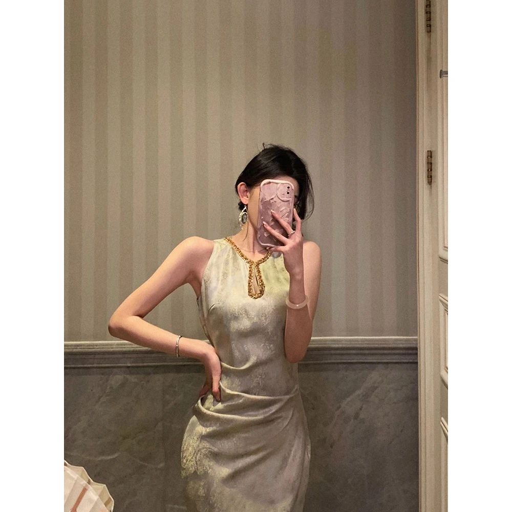 新中式鎏金改良旗袍连衣裙女2025年新款国风气质无袖修身收腰长裙