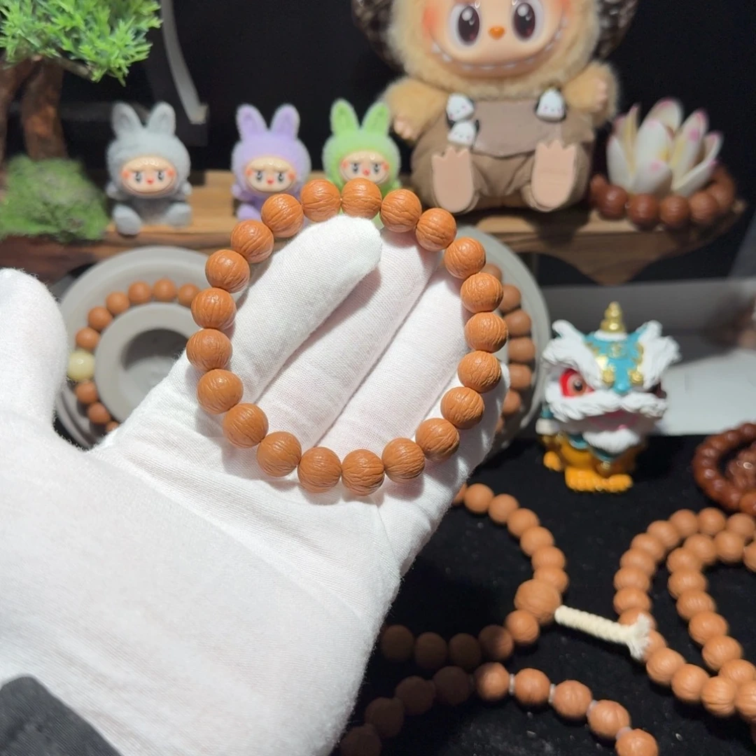 ￴***核桃原皮原色原生态凤羽手持11+30颗