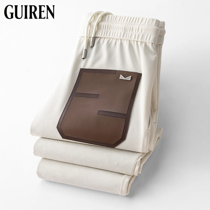 高级感夏季薄款冰感丝滑休闲裤男修身小直筒时尚侧边织带男士长裤