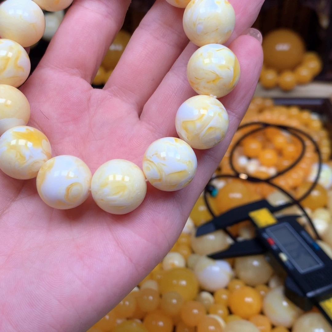 无非金属玉**声仿琥珀 手串111