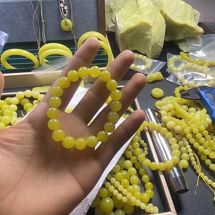 盼***盼非金属无卡10手串鸡油黄