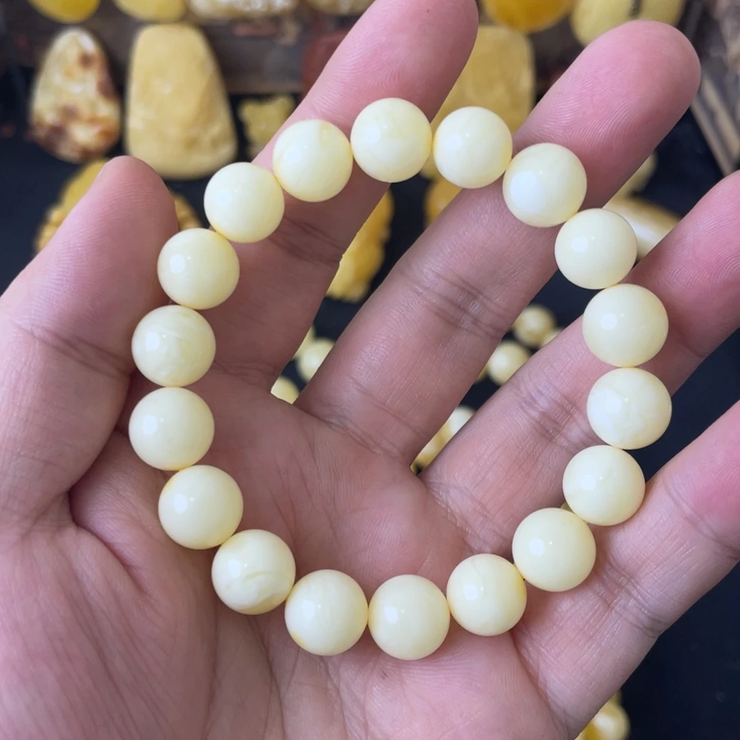 琥珀未镶嵌手串11+俄料浓蜡奶白圆珠手串