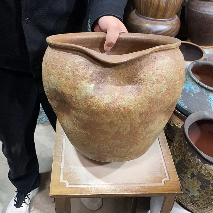 紫砂花盆口28高度26铁锈拳头………