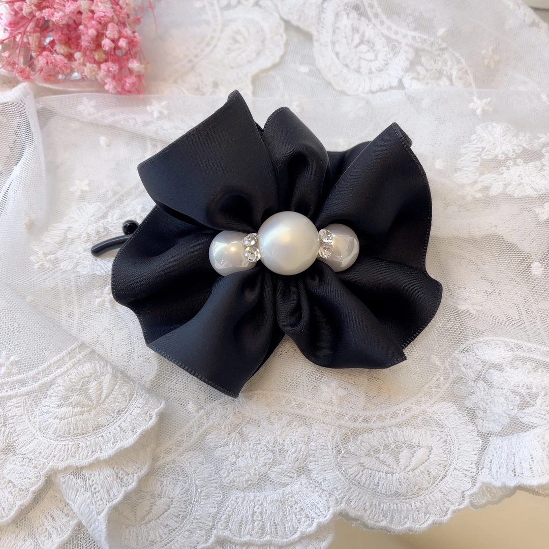 W986韩系设计轻奢简约气质花苞扭扭夹