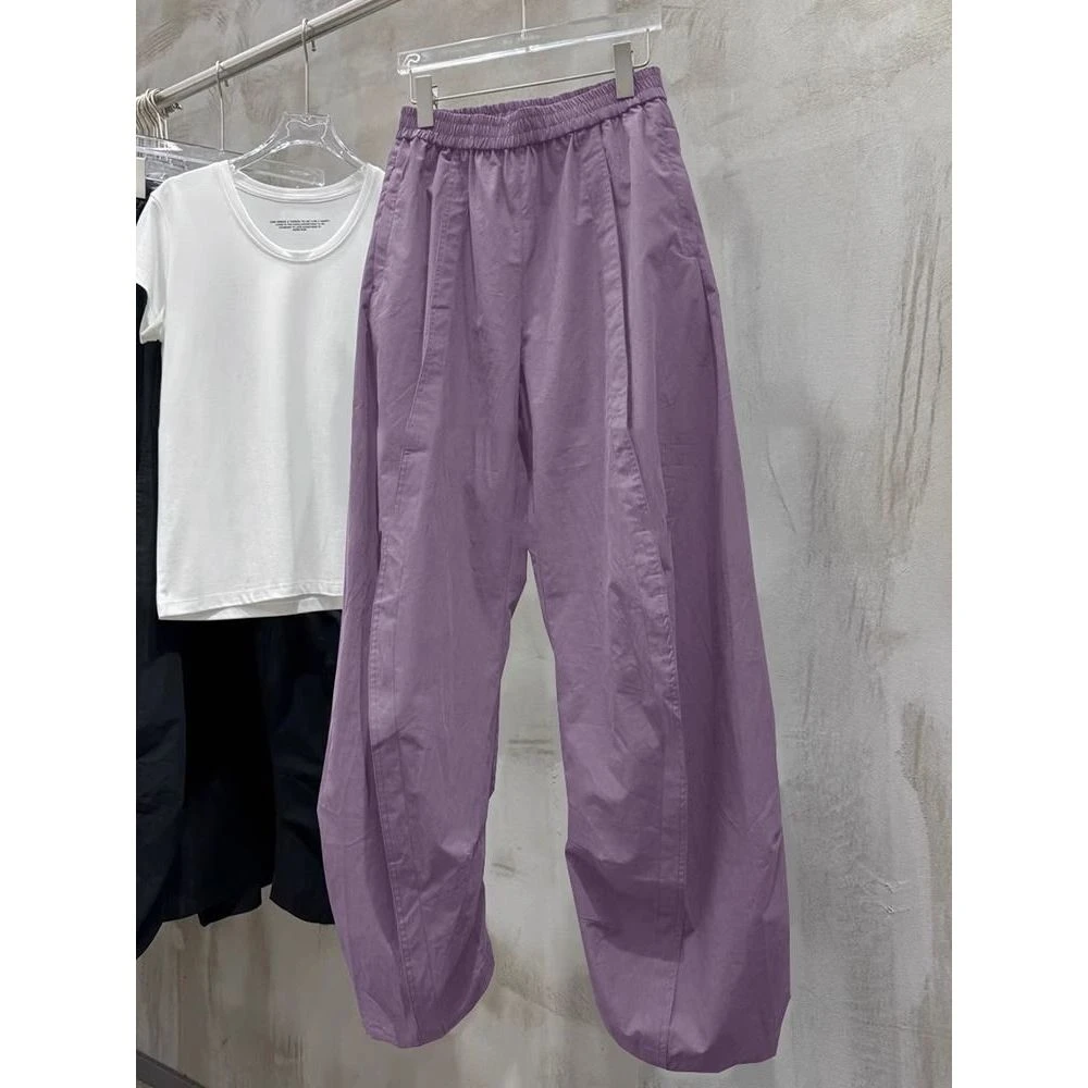 2025年夏季新款炸街紫色速干运动休闲裤女弯刀裤设计收腿裤子