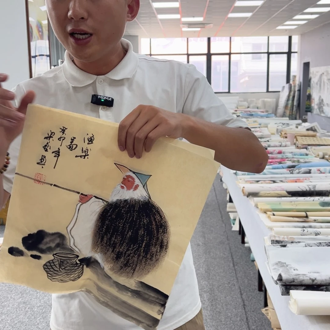 国画卖字画的小男孩