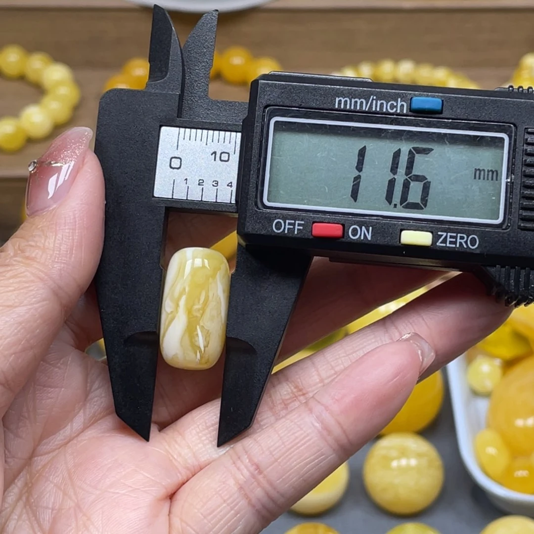 蜜蜡裸石未镶嵌乐*人