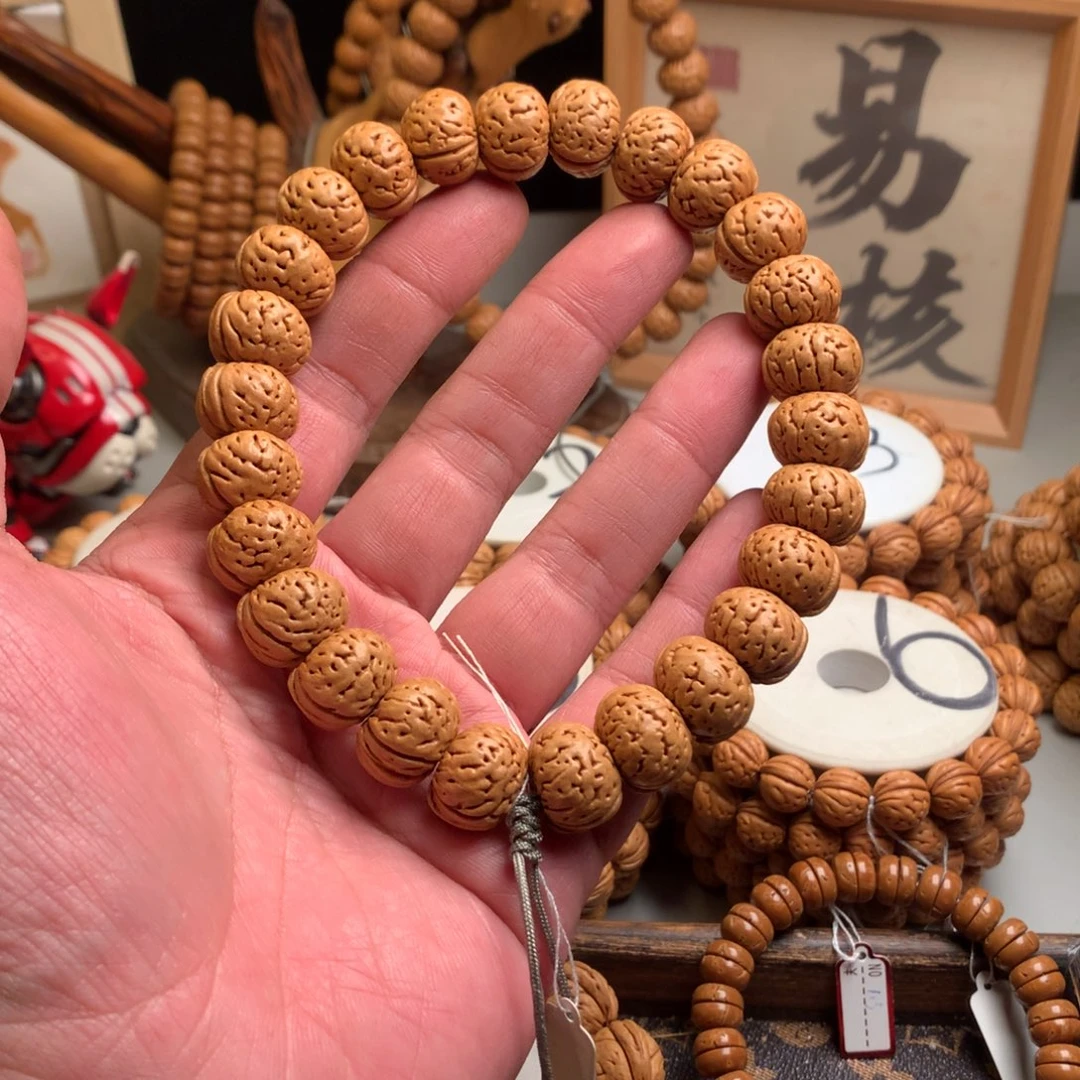 洋***懿桃核手串1.7树王纽扣手持