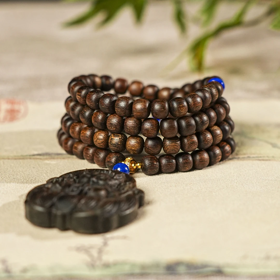 富森红土树心油W年雷击瘤疤老料0.7*0.8多圈+凤九富森沉香木雕