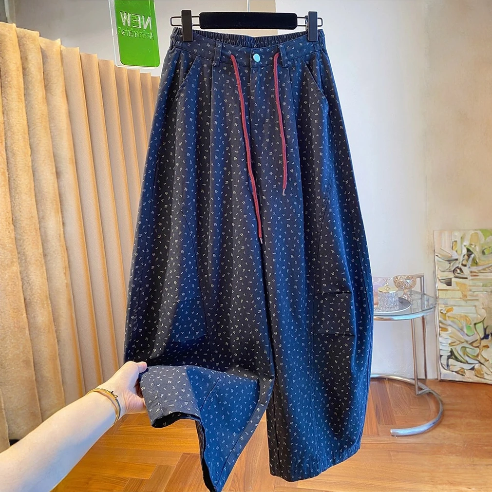 高级感碎花裤子女2025新款秋季宽松休闲显瘦百搭弯刀裤九分弯刀裤