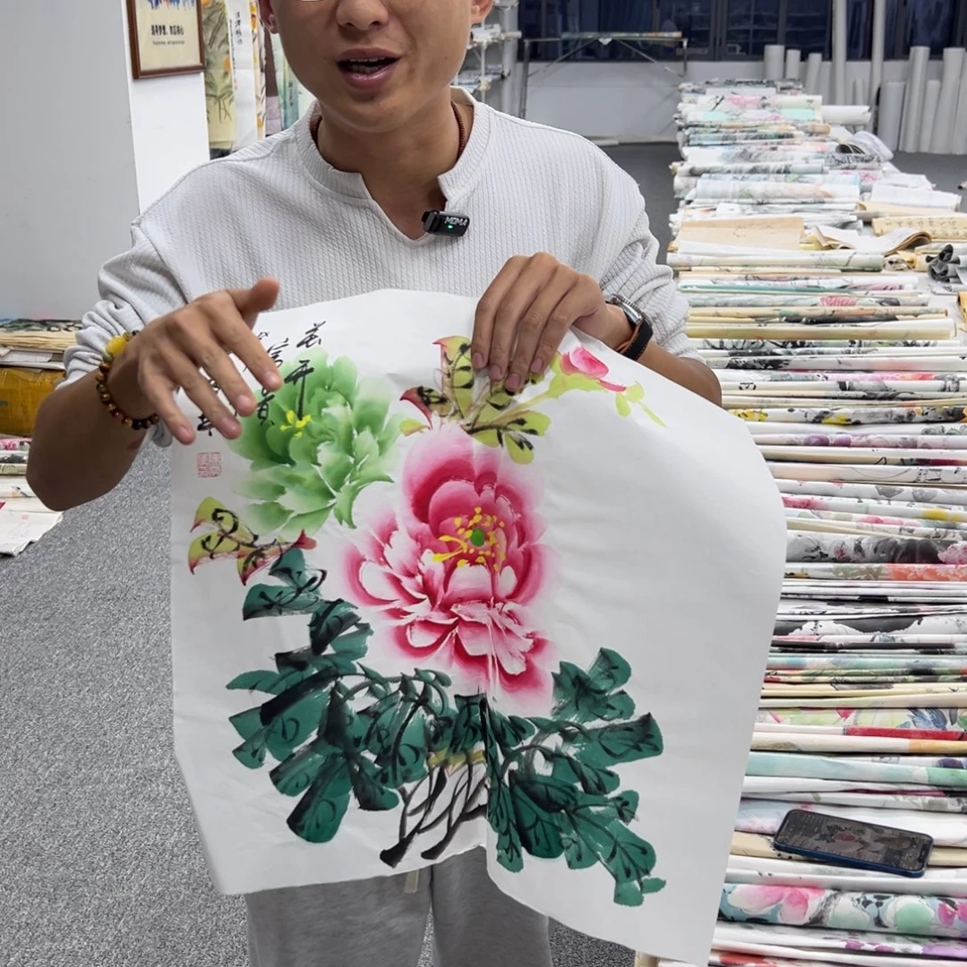 国画卖字画的小男孩