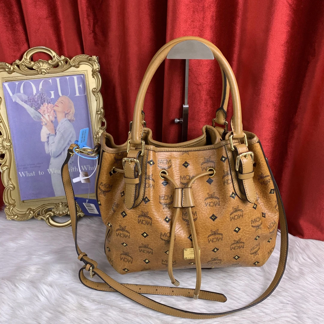 95新 MCM 干邑色抽绳福袋包/EE09729018/9018