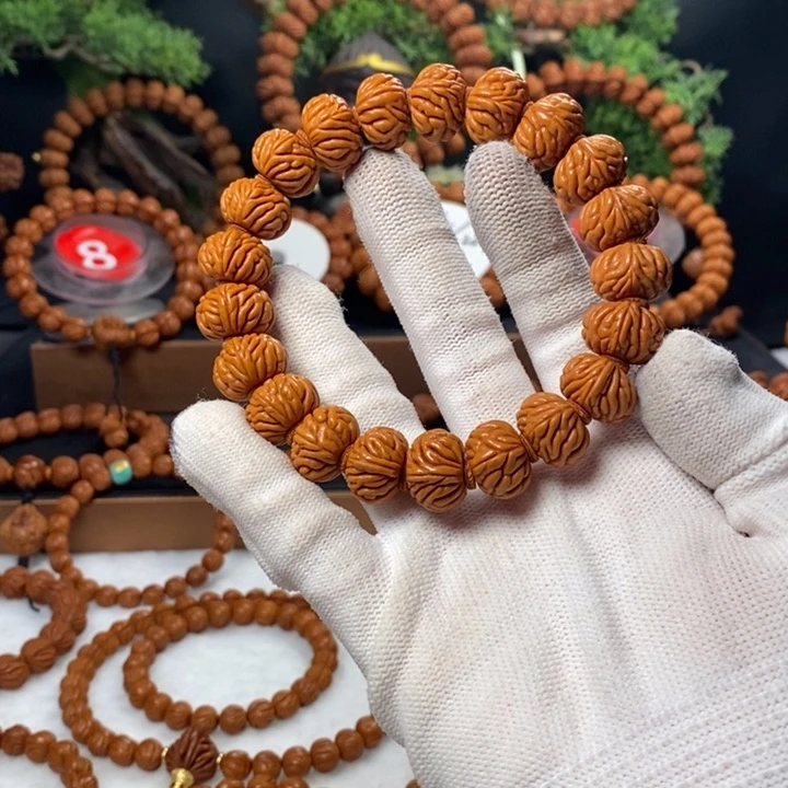 桃核吊坠牛*?秦岭龙纹