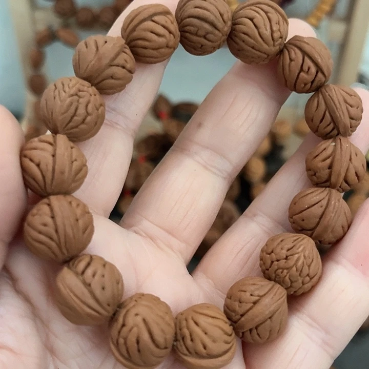 @***风野生桃枭小籽手串