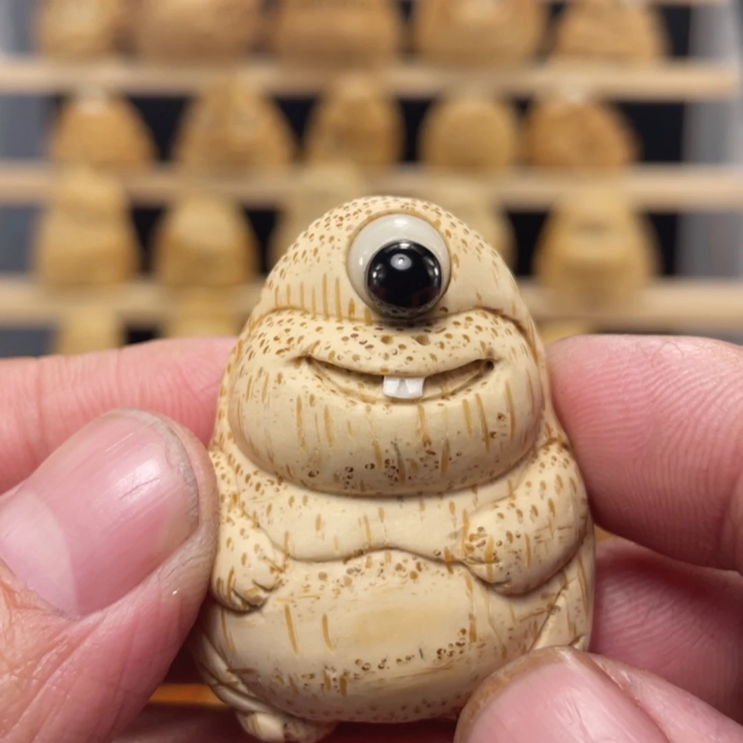 竹竹根雕独眼手把件