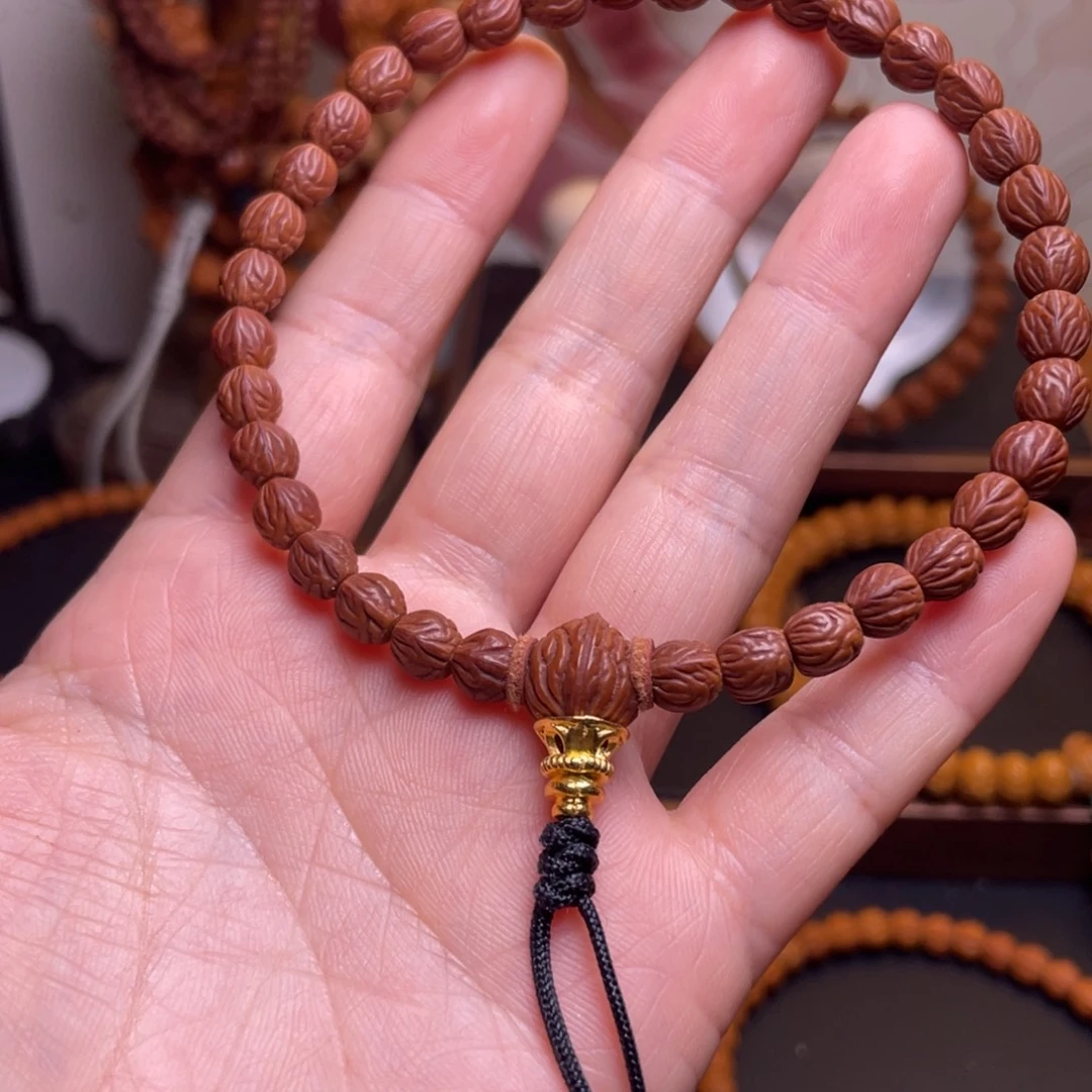 有***财桃核吊坠龙文桃核