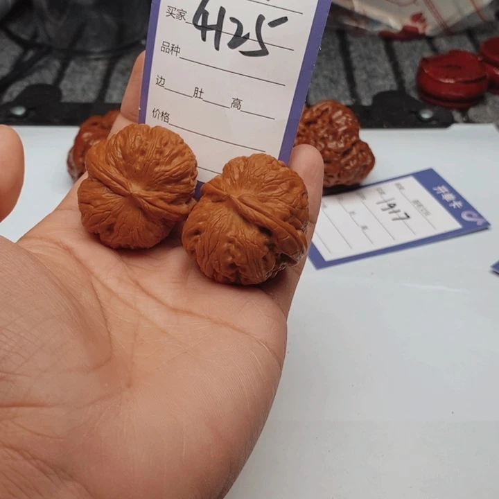 文玩核桃吊坠42全品红皮元宝。4125