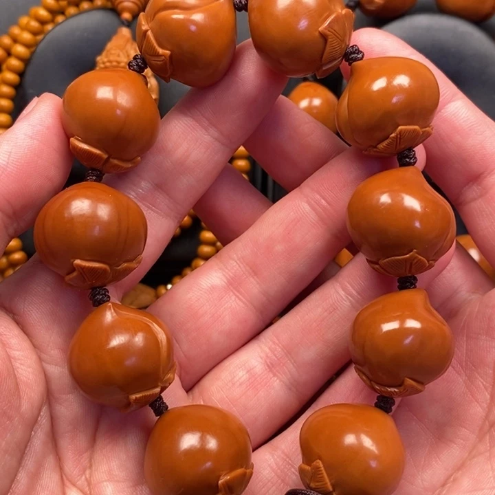 淇***淇手串橄榄核22桃子