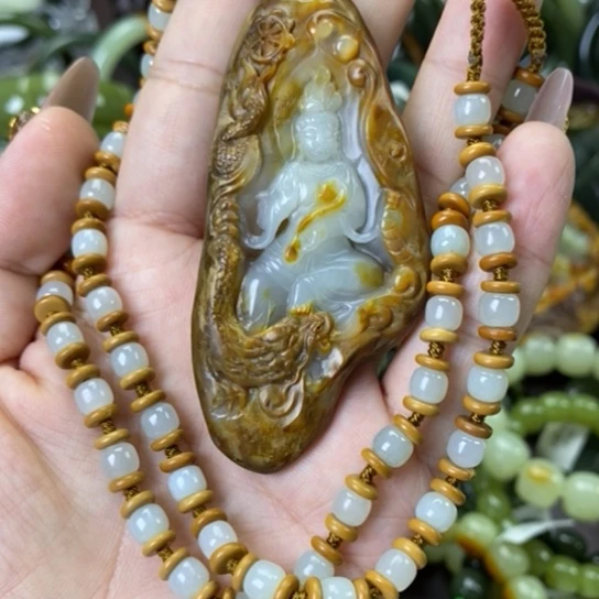 玉天****)手工全皮挂件观音