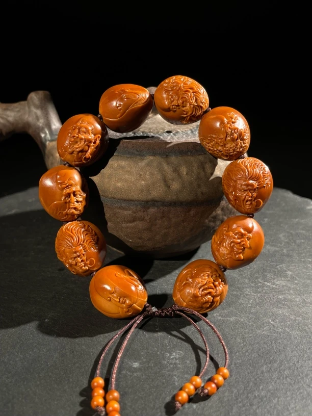 周东林橄榄核雕双面浮雕写实罗汉苏工纯手工雕刻男士精品老料文玩