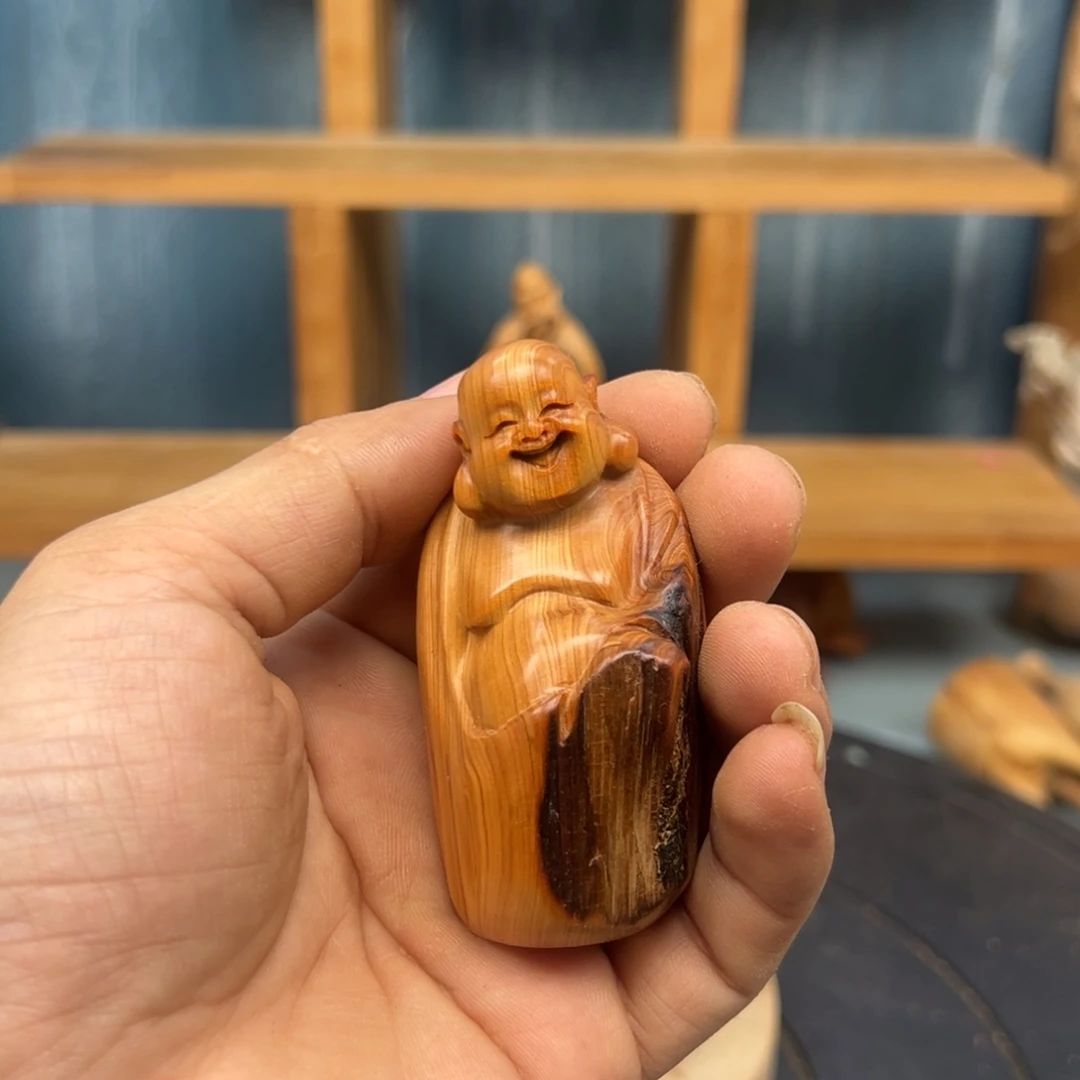 木小****吃崖柏木摆件手把件