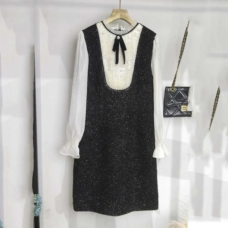 名媛甜美气质蝴蝶结泡泡袖小黑裙2025新款拼接A字小香风连衣裙女