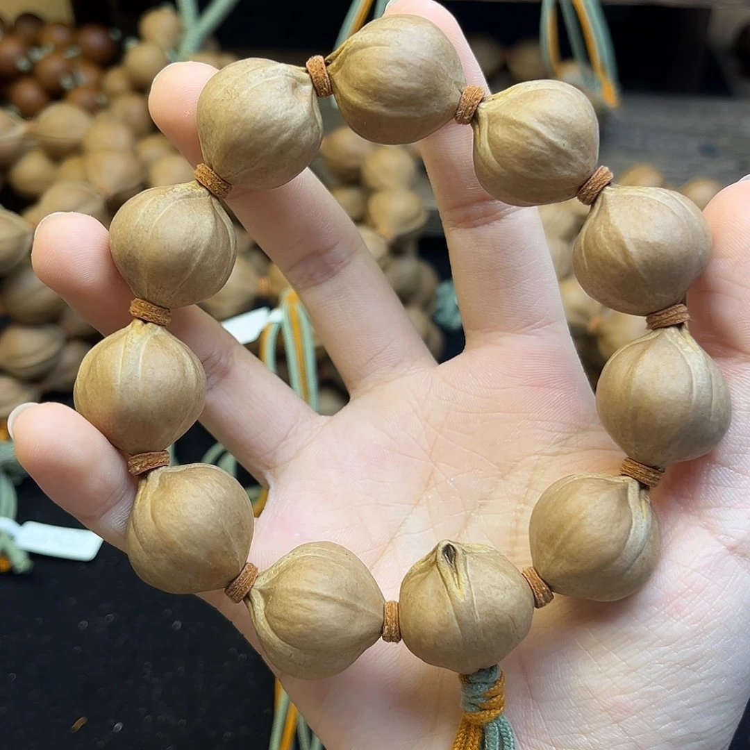 菩***坐手串橄榄核001 22×24