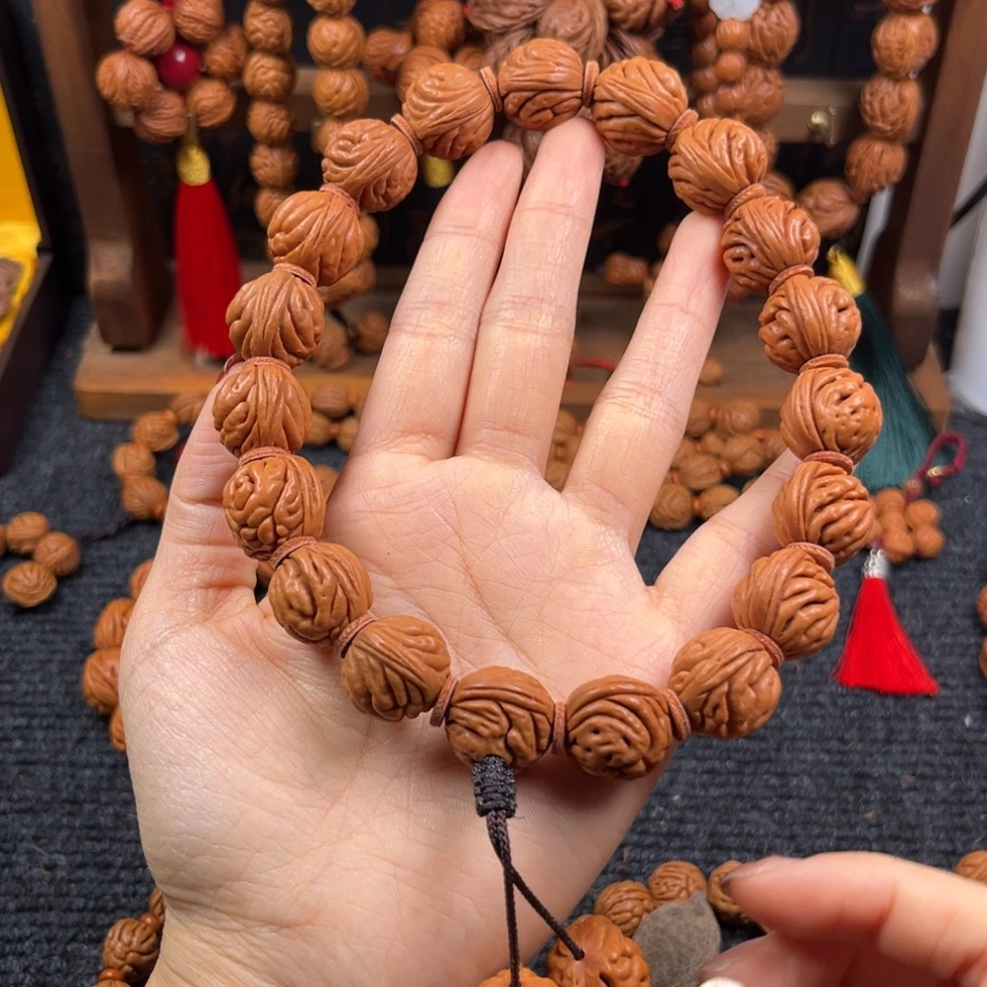 铜***烧吊坠桃核桃枭手持L6