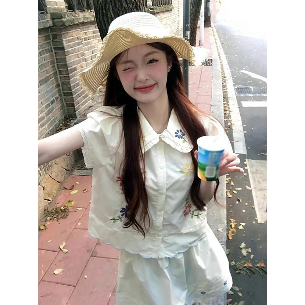 日系甜美娃娃领衬衫套装女夏2024新款碎花刺绣显瘦半身裙子两件套