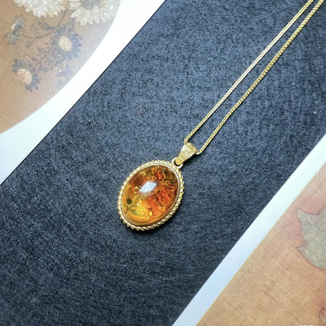 天然原矿花珀大蛋面吊坠S925银镶嵌时尚