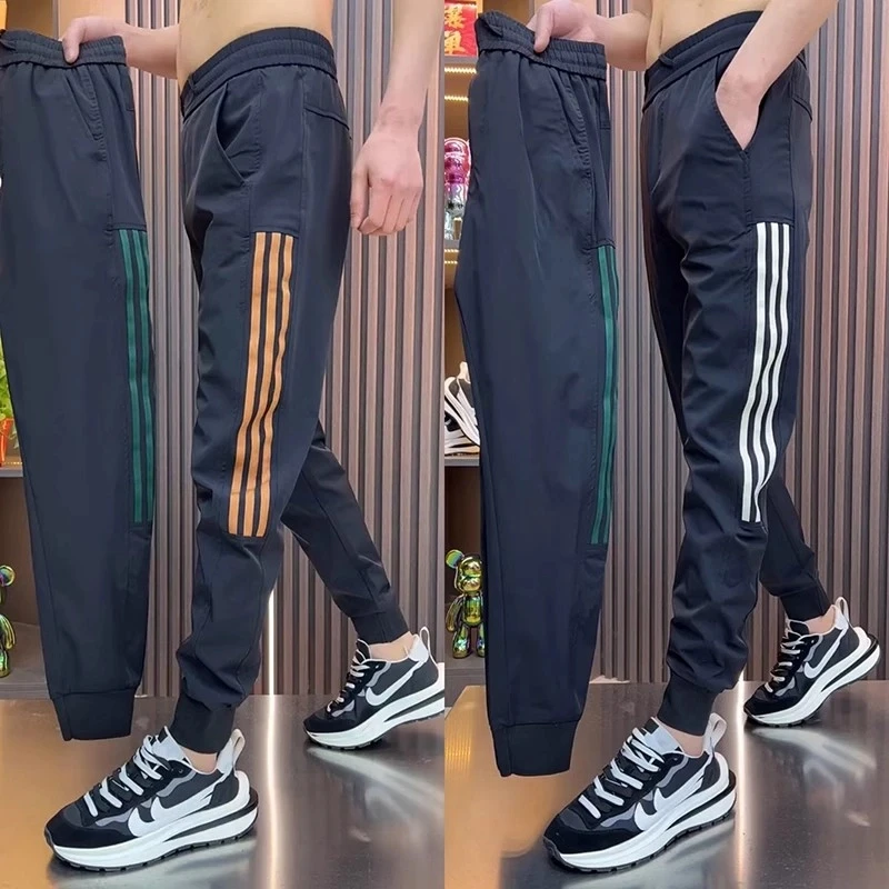 2025爆款运动裤男装高级感男装身小脚长裤杠条潮流男生休闲哈伦裤