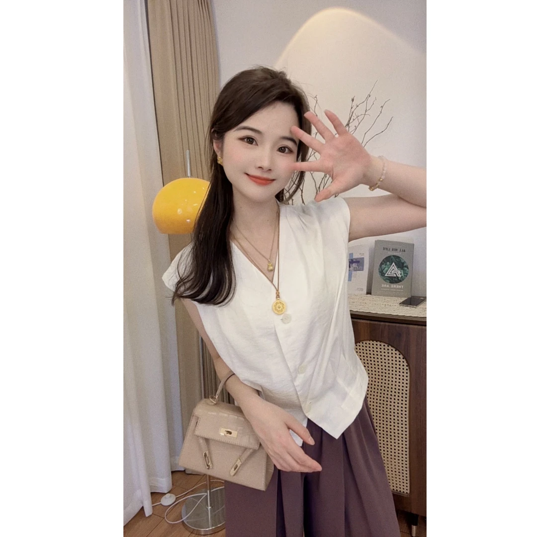 法式V领亚麻无袖衬衫女上衣2025夏季新款设计感收腰显瘦马甲小衫