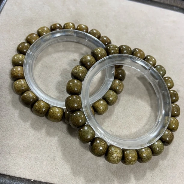 A349金丝楠木 卡10mm桶珠单圈手串