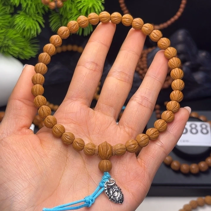 喷***娃吊坠桃核玉龙脊0.8