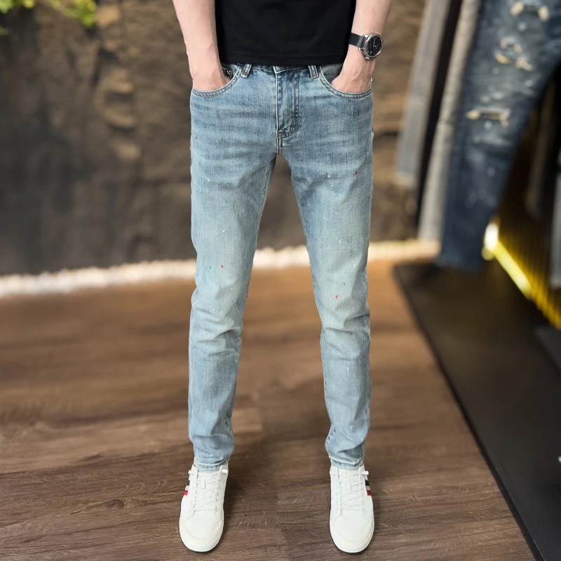 春夏季薄款男士牛仔裤潮流漆点印花水洗浅蓝修身弹力小脚裤子长裤