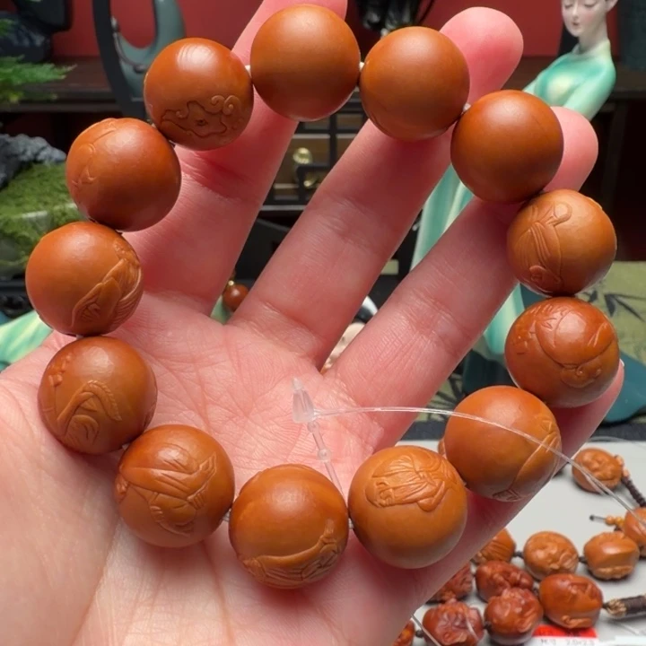 橄榄核手串/手链正圆浮雕罗汉头