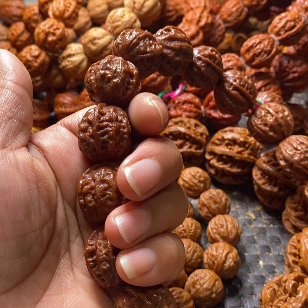 姜***》文玩核桃吊坠三棱