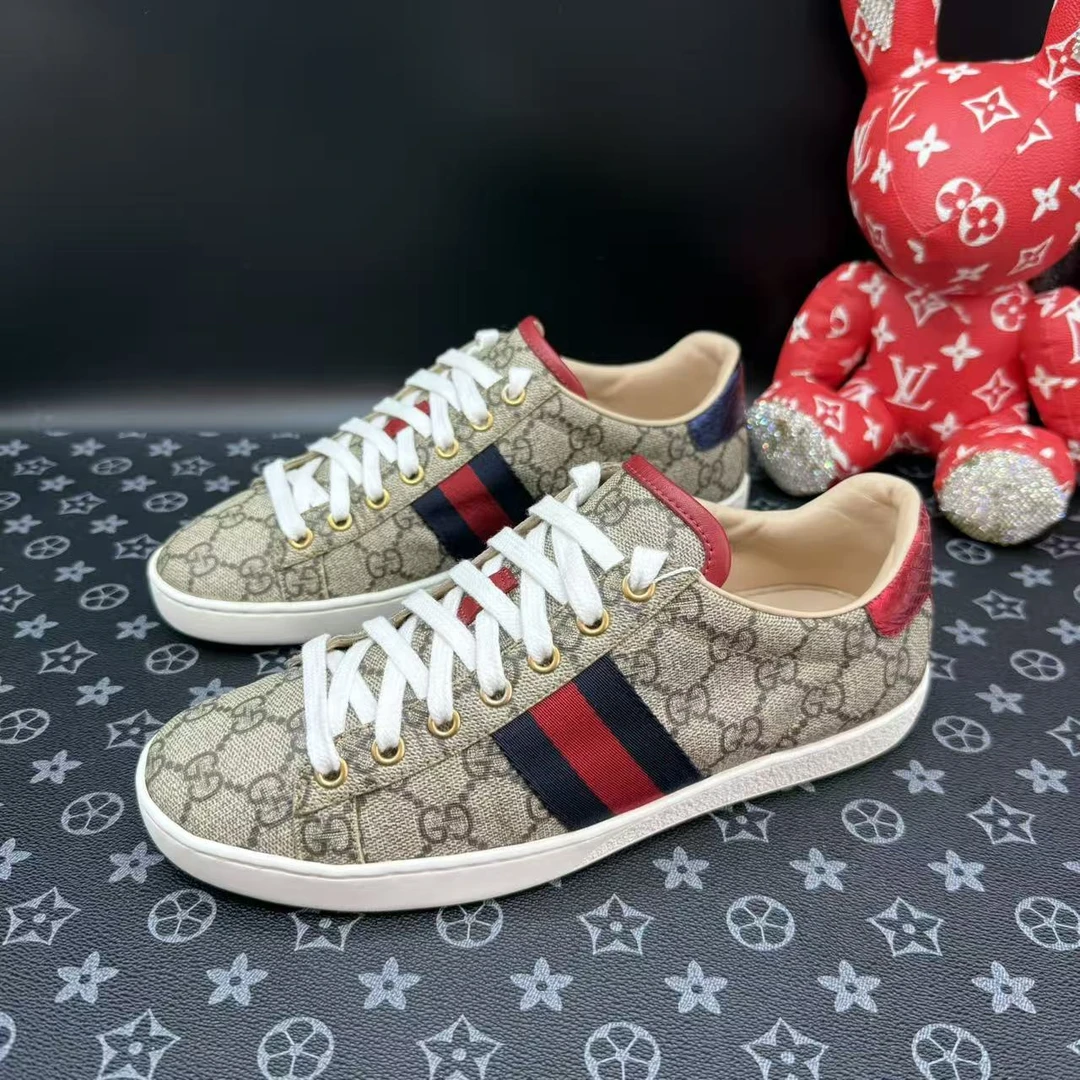 95新 GUCCI/古驰 男士棕老花满印板鞋38欧码 ddm3338