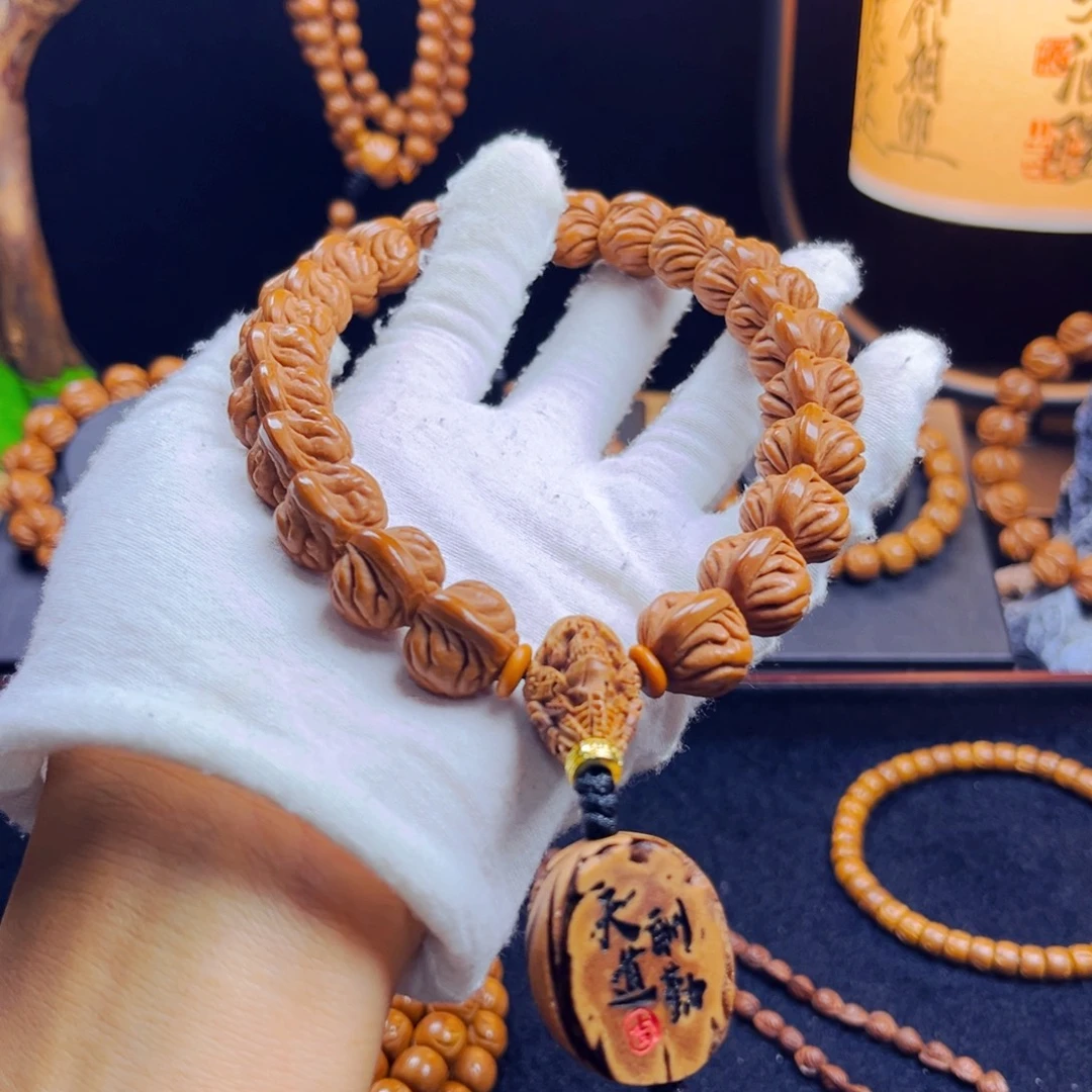 雪***头桃核吊坠野生桃核