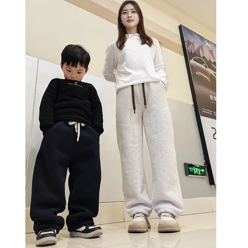 2025新款仿兔貂冬季亲子男女中大童特厚一体绒直筒抽绳束脚弯刀裤