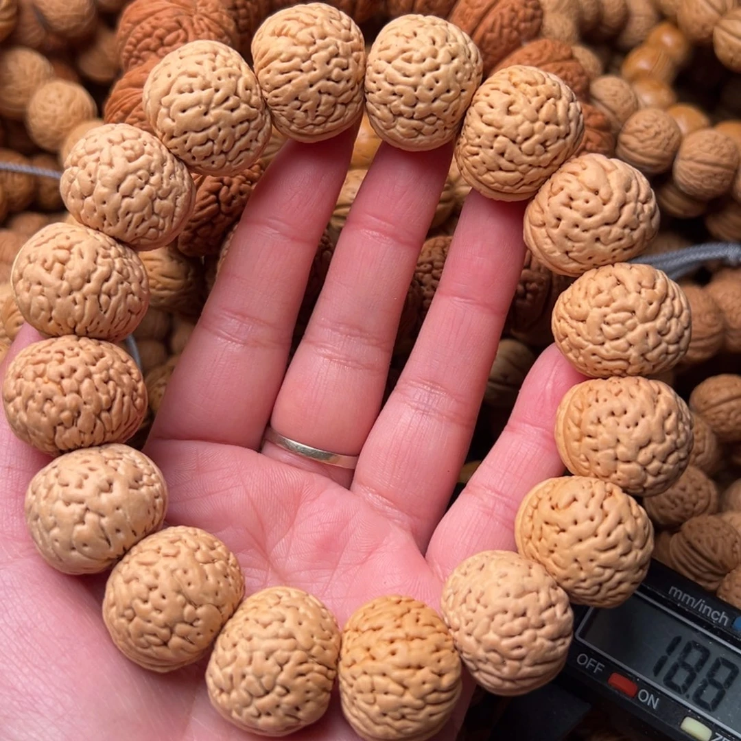 22➕尺寸苹果圆桃核手串